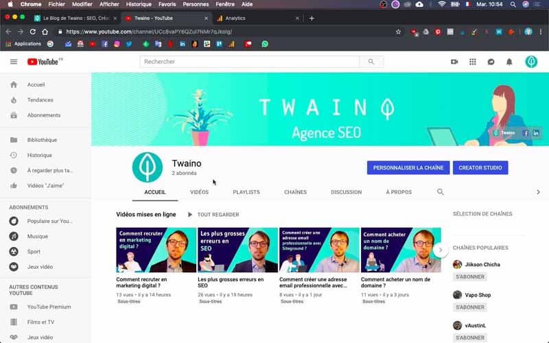 Capture d'écran interface YouTube avec bannière colorée et vidéos recommandées